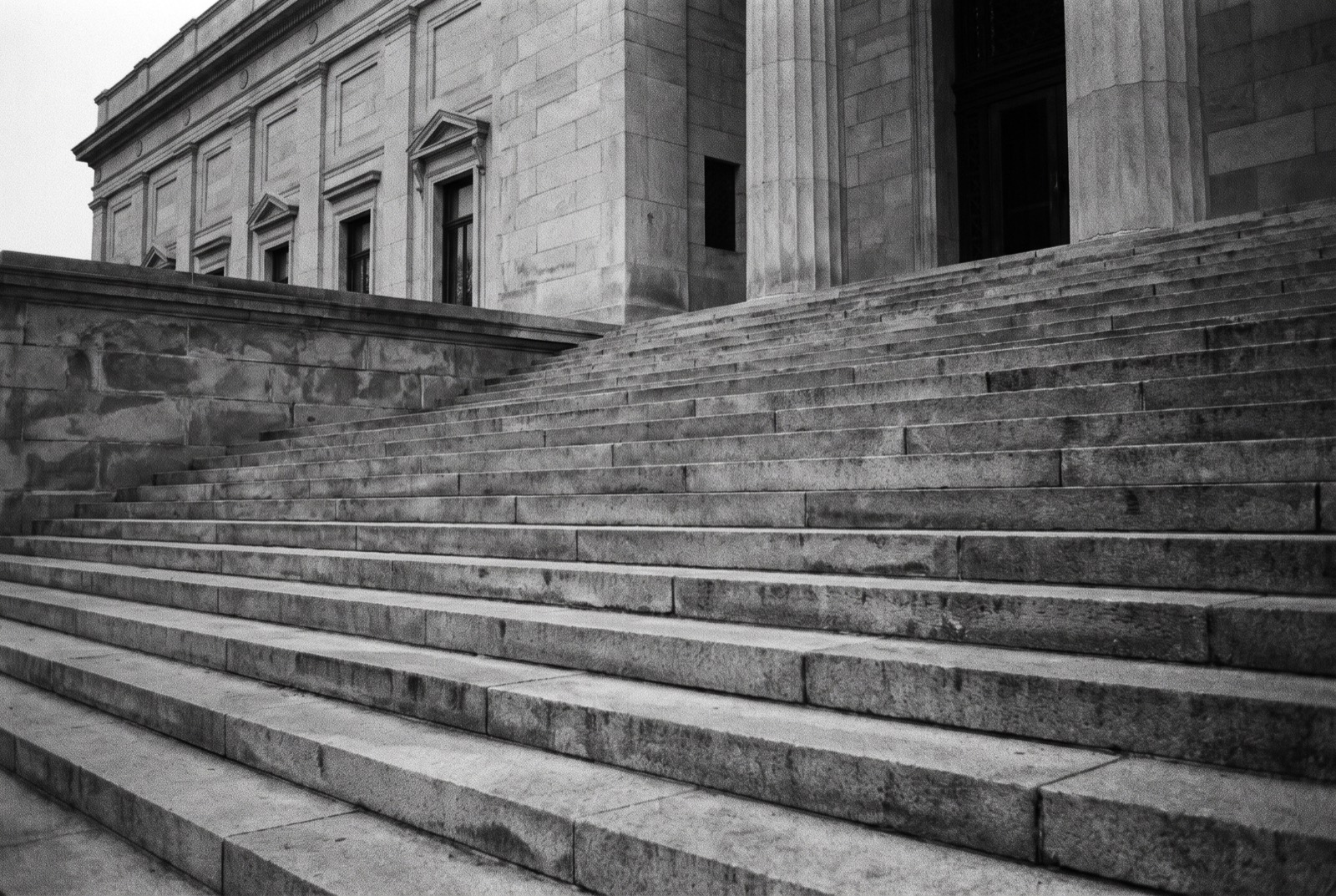 Wide empty stone steps outside a public building